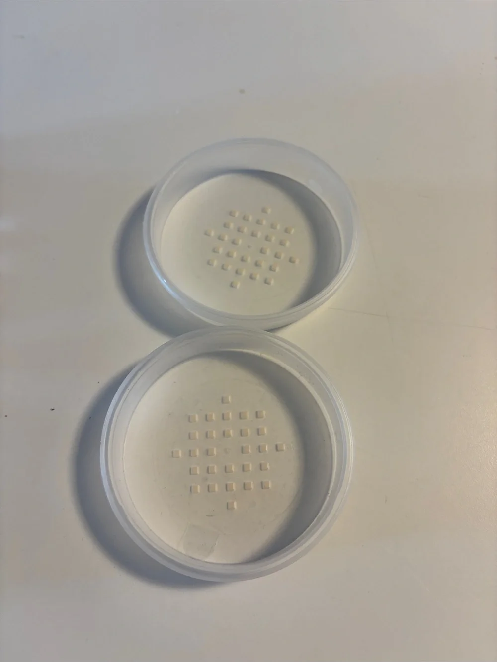 Chanel powder jars and puffs